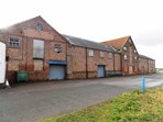 Former Kings Road Tyre Depot, Station Road