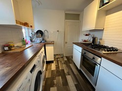 Image of Kitchen (Upstairs flat) - Modern kitchen. Fitted appliances, laminate flooring and double radiator.